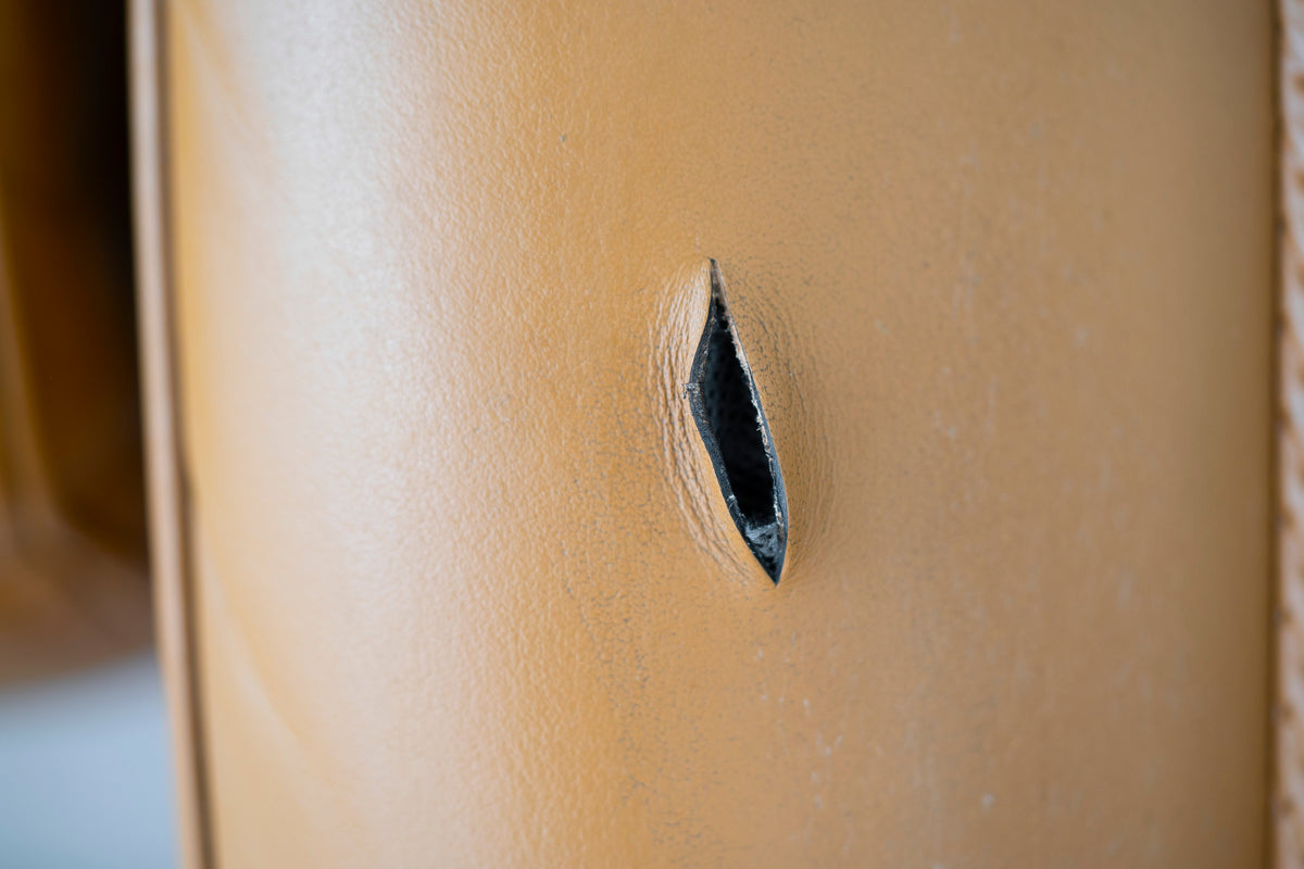 Detailing1 COLOURLOCK leather glue & seam repair — tear in smooth leather before the repair